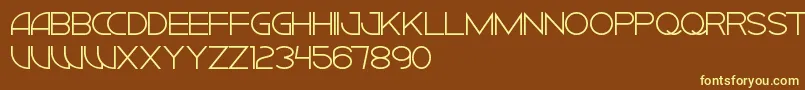 CiudadNuevaCaps-fontti – keltaiset fontit ruskealla taustalla