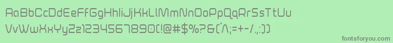 フォントfoxontheruncond – 緑の背景に灰色の文字