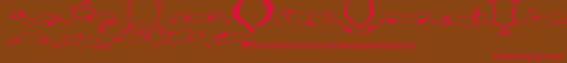 Frames n Riboons-Schriftart – Rote Schriften auf braunem Hintergrund