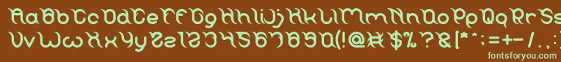 フォントFRANKENSTEIN MONSTER – 緑色の文字が茶色の背景にあります。