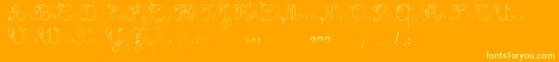 MaternellecolorTraceCursive Font – Yellow Fonts on Orange Background