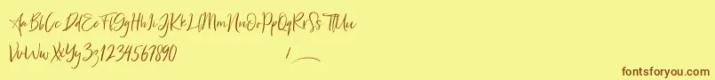 Freaks Font – Brown Fonts on Yellow Background