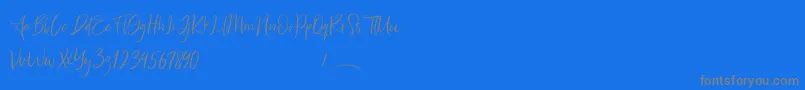 Freaks Font – Gray Fonts on Blue Background