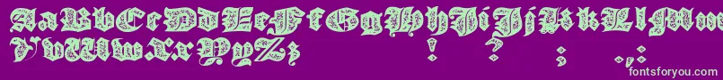 JmhMorenetaDivineOld Font – Green Fonts on Purple Background