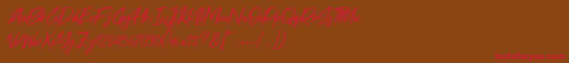 Free Pen-Schriftart – Rote Schriften auf braunem Hintergrund