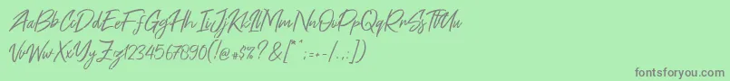 Free Pen-Schriftart – Graue Schriften auf grünem Hintergrund
