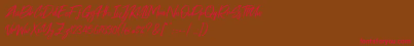 Free Pen Font – Red Fonts on Brown Background