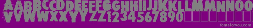 Free press-fontti – harmaat kirjasimet violetilla taustalla