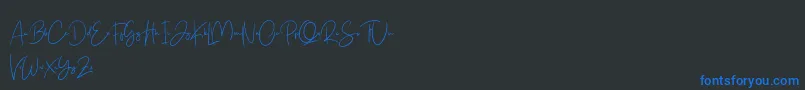 Free Yuminika Script Font – Blue Fonts on Black Background