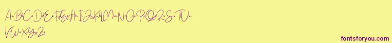 Free Yuminika Script-Schriftart – Violette Schriften auf gelbem Hintergrund