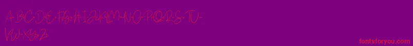 Free Yuminika Script-Schriftart – Rote Schriften auf violettem Hintergrund