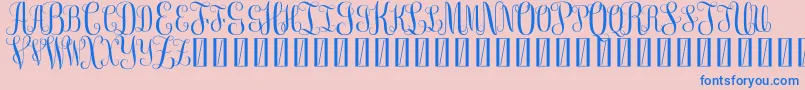 FreeMonogram Beta 0 5 Font – Blue Fonts on Pink Background