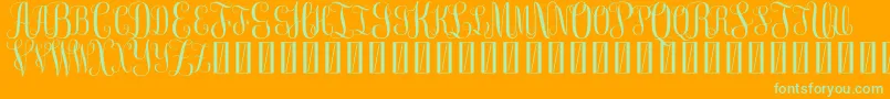 FreeMonogram Beta 0 5-Schriftart – Grüne Schriften auf orangefarbenem Hintergrund