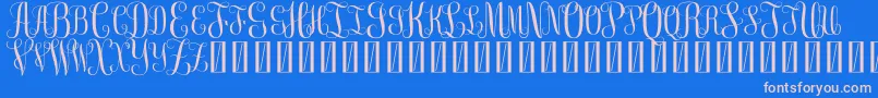 FreeMonogram Beta 0 5 Font – Pink Fonts on Blue Background