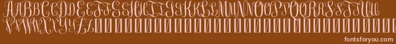 FreeMonogram Beta 0 5 Font – Pink Fonts on Brown Background