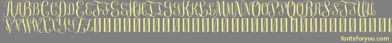 FreeMonogram Beta 0 5 Font – Yellow Fonts on Gray Background