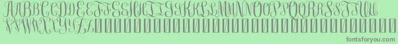 FreeMonogram Beta 0 5-Schriftart – Graue Schriften auf grünem Hintergrund