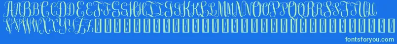 FreeMonogram Beta 0 5-Schriftart – Grüne Schriften auf blauem Hintergrund