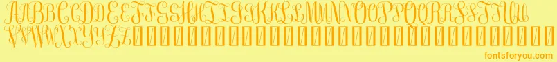 FreeMonogram Beta 0 5 Font – Orange Fonts on Yellow Background