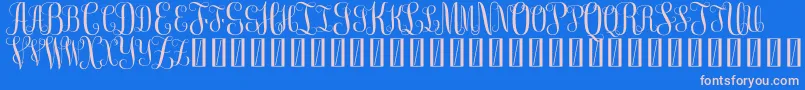 FreeMonogram Beta 0 5 Font – Pink Fonts on Blue Background