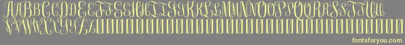 FreeMonogram Beta 0 5 Font – Yellow Fonts on Gray Background