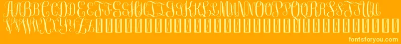 FreeMonogram Beta 0 5-Schriftart – Gelbe Schriften auf orangefarbenem Hintergrund