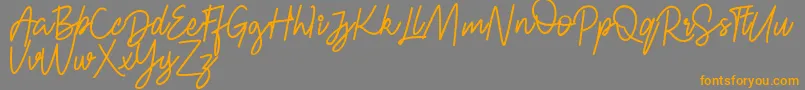 FRESH BERRIES Script FREE-Schriftart – Orangefarbene Schriften auf grauem Hintergrund