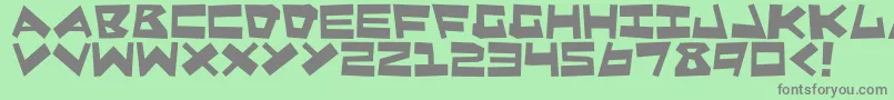 フォントQuakeShake – 緑の背景に灰色の文字