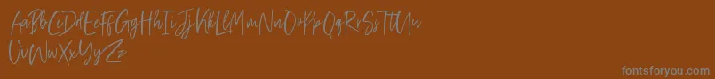 Friday Vibes Font – Gray Fonts on Brown Background