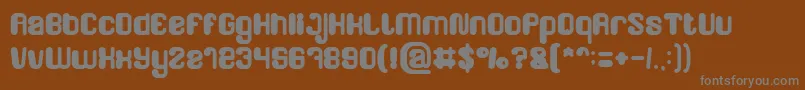 Weitere Informationen zur FRIENDLY ROBOT Bold-Schriftart FRIENDLY ROBOT Bold-Schriftart – Graue Schriften auf braunem Hintergrund