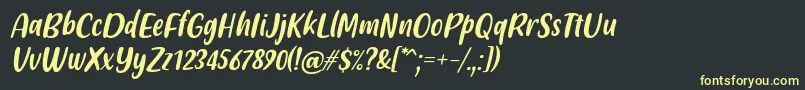Friendly Schoolmates Italic Font by Situjuh 7NTypes Font – Yellow Fonts on Black Background