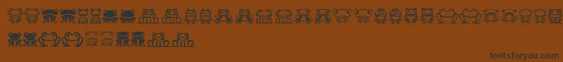Froggy-Schriftart – Schwarze Schriften auf braunem Hintergrund