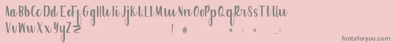 Weitere Informationen zur FrogresFree-Schriftart FrogresFree-Schriftart – Graue Schriften auf rosa Hintergrund
