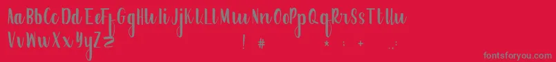 フォントFrogresFree – 赤い背景に灰色の文字