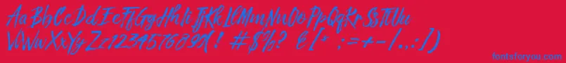 Fronte Script-Schriftart – Blaue Schriften auf rotem Hintergrund