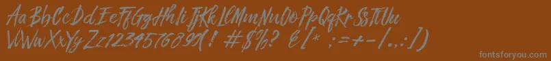 フォントFronte Script – 茶色の背景に灰色の文字