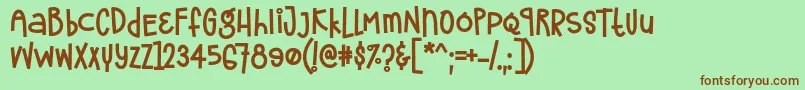 フォントFrostela Font by 7NTypes – 緑の背景に茶色のフォント