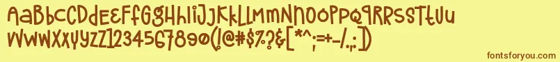 フォントFrostela Font by 7NTypes – 茶色の文字が黄色の背景にあります。