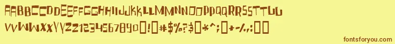フォントFRUIDC   – 茶色の文字が黄色の背景にあります。