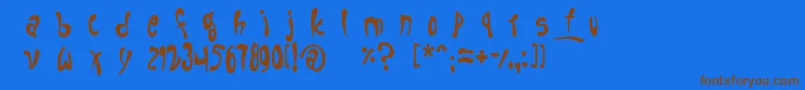 フォントfruitopia – 茶色の文字が青い背景にあります。