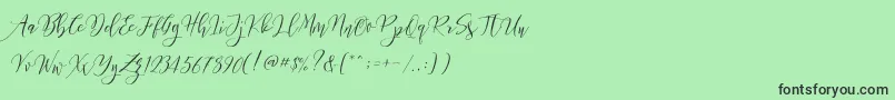 Frutilla Script Font – Black Fonts on Green Background