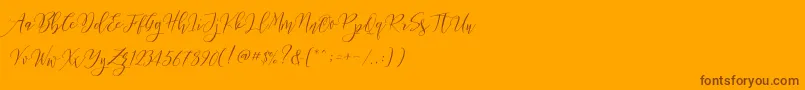 Frutilla Script Font – Brown Fonts on Orange Background