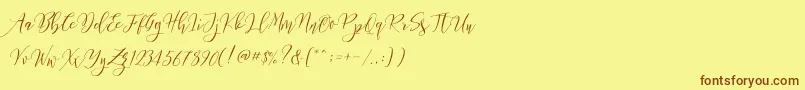 Шрифт Frutilla Script – коричневые шрифты на жёлтом фоне