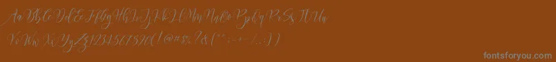 Шрифт Frutilla Script – серые шрифты на коричневом фоне