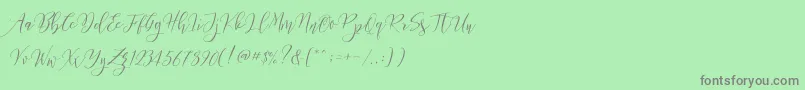 Frutilla Script Font – Gray Fonts on Green Background