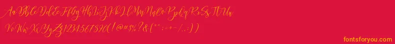 Frutilla Script Font – Orange Fonts on Red Background