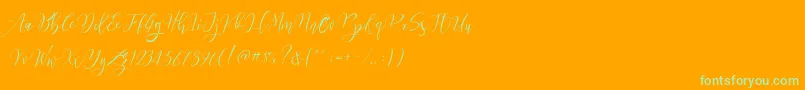 Czcionka Frutilla Script – zielone czcionki na pomarańczowym tle