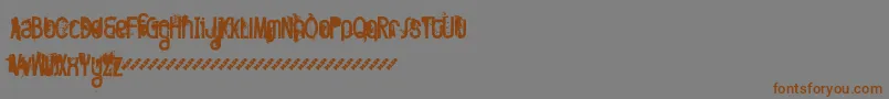 フォントFTTWOD   – 茶色の文字が灰色の背景にあります。