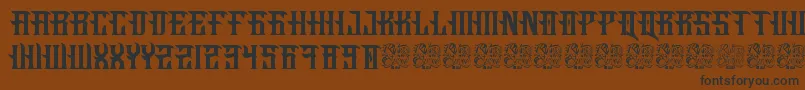 Шрифт Fucking Hostile – чёрные шрифты на коричневом фоне