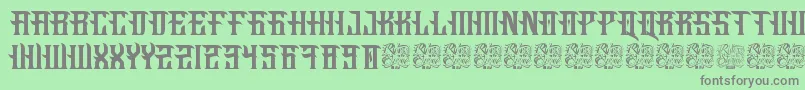 Fucking Hostile-fontti – harmaat kirjasimet vihreällä taustalla